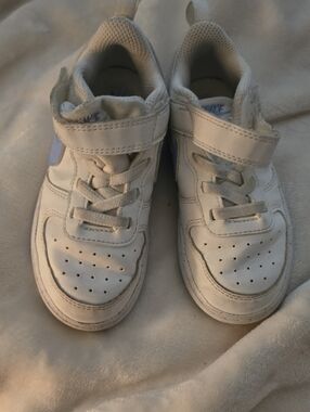 Nike Kids White Sneakers with Light Blue Accent